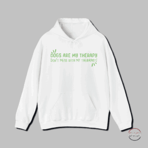 Stay cozy and make a statement with this humorous Gildan Dog Therapy Hoodie featuring the text 'Dogs Are My Therapy - Don't Mess With My Therapist'. Perfect for dog lovers who find comfort in their furry friends, this hoodie is a fun and stylish way to showcase your love for dogs. A great gift for dog owners or as a treat for yourself during Dog Appreciation Day or any time you need a pick-me-up.