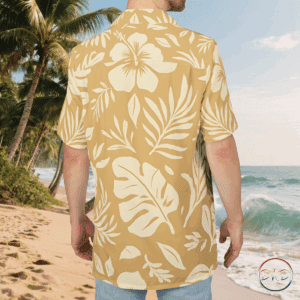 A unisex Hawaiian button-down shirt featuring a warm, pale orange background with off-white tropical florals—hibiscus blooms, monstera leaves, palm fronds, and ferns. It exudes a classic island vibe with a soft, elegant twist. Perfect for those looking for a casual yet polished look, ideal for beach outings or low-key settings. Relevant for summer vacations, beach parties, and tropical-themed events.
