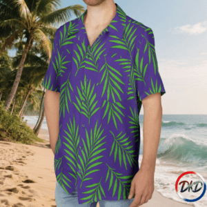Model front wearing shirt against a tropical beach background Fresh, bold, and unmistakably tropical — Purple Palm Breeze brings a vibrant modern twist to the classic unisex Hawaiian shirt. The deep purple backdrop sets a rich, stylish tone, while bright green palm leaves sweep across the fabric in a crisp, high‑contrast pattern. Lightweight, breathable, and relaxed in fit, this shirt is perfect for vacations, beach days, summer parties, or adding a lively island vibe to your everyday wardrobe.