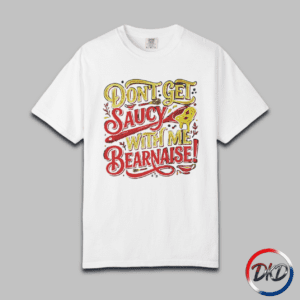 Serve up some attitude with this playful “Don’t Get Saucy With Me Béarnaise!” Comfort Colors® tee — the perfect blend of chef humor, retro diner vibes, and laid‑back everyday style. Printed on the fan‑favorite Comfort Colors® 1717, this shirt delivers that soft‑washed, lived‑in feel people love, available in six classic garment‑dyed colors.