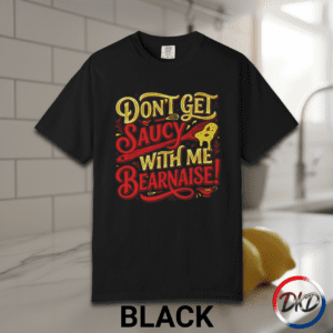 Serve up some attitude with this playful “Don’t Get Saucy With Me Béarnaise!” Comfort Colors® tee — the perfect blend of chef humor, retro diner vibes, and laid‑back everyday style. Printed on the fan‑favorite Comfort Colors® 1717, this shirt delivers that soft‑washed, lived‑in feel people love, available in six classic garment‑dyed colors.