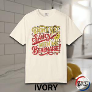 Serve up some attitude with this playful “Don’t Get Saucy With Me Béarnaise!” Comfort Colors® tee — the perfect blend of chef humor, retro diner vibes, and laid‑back everyday style. Printed on the fan‑favorite Comfort Colors® 1717, this shirt delivers that soft‑washed, lived‑in feel people love, available in six classic garment‑dyed colors.