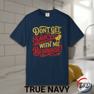 Serve up some attitude with this playful “Don’t Get Saucy With Me Béarnaise!” Comfort Colors® tee — the perfect blend of chef humor, retro diner vibes, and laid‑back everyday style. Printed on the fan‑favorite Comfort Colors® 1717, this shirt delivers that soft‑washed, lived‑in feel people love, available in six classic garment‑dyed colors.
