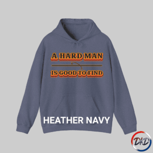 A Heather Navy hooded sweatshirt featuring bold retro orange‑and‑brown typography that reads “A Hard Man Is Good to Find,” with a vintage curved accent line and star centered between the text lines.