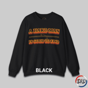 A Black unisex fit crewneck sweatshirt featuring bold retro orange‑and‑brown typography that reads “A Hard Man Is Good to Find,” with a vintage curved accent line and star between the text lines.