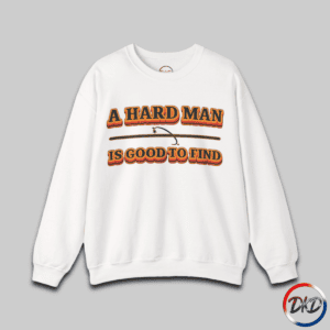A white unisex fit crewneck sweatshirt featuring bold retro orange‑and‑brown typography that reads “A Hard Man Is Good to Find,” with a vintage curved accent line and star between the text lines.