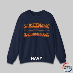 A Navy unisex fit crewneck sweatshirt featuring bold retro orange‑and‑brown typography that reads “A Hard Man Is Good to Find,” with a vintage curved accent line and star between the text lines.